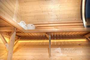 The interior of the Delight Sauna - wooden benches line the rounded interior walls