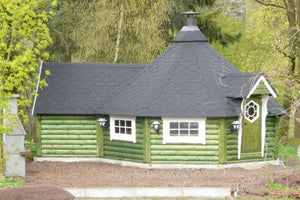 BBQ hut in Salt Green (wood stain) nestled within a clearing in a glade of trees