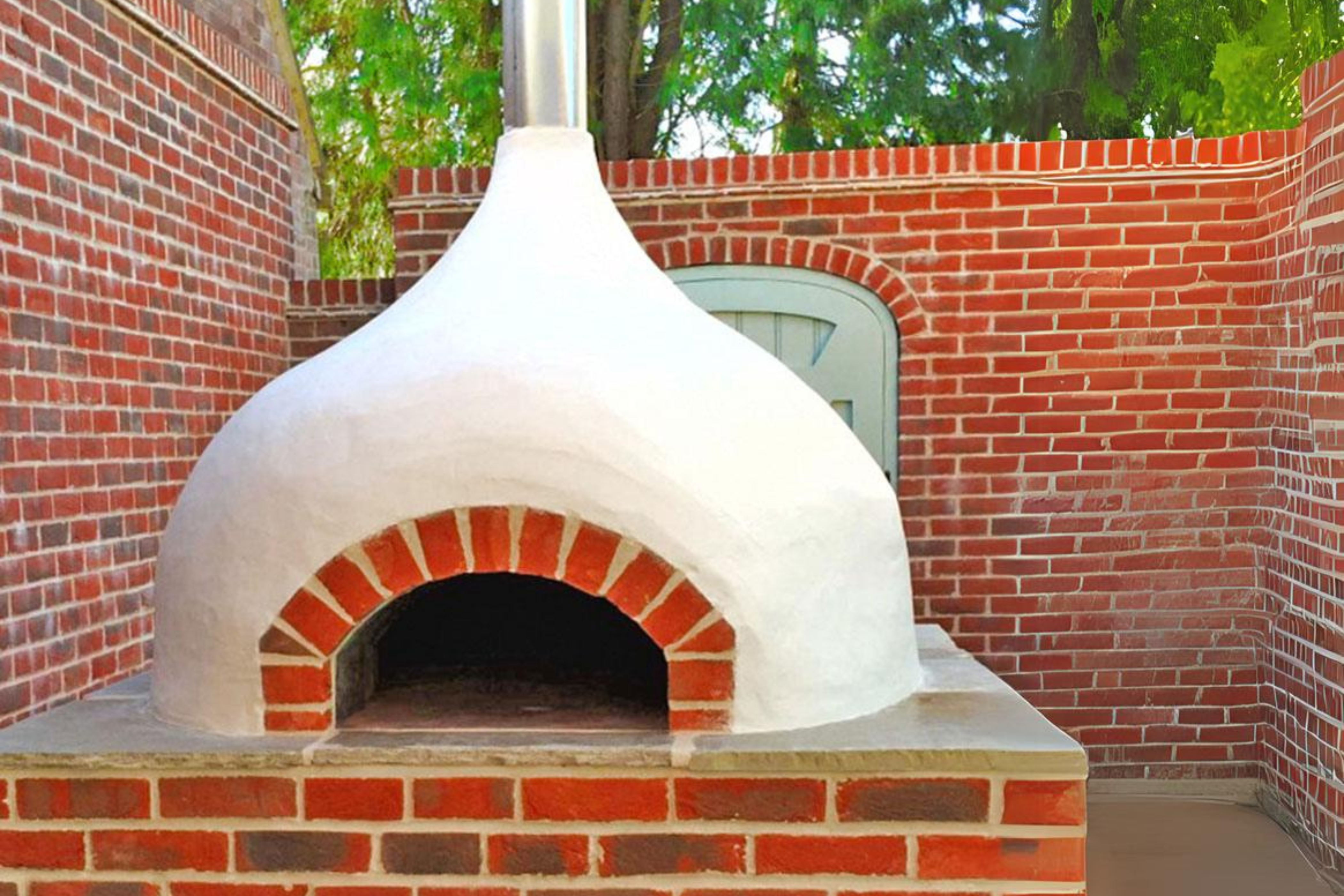 The Ceramiko Pro 1000 wood fired pizza oven outdoor on a brick table nestled within brick walls