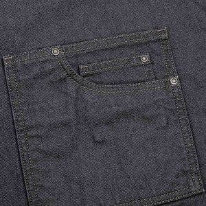 A close up shot of the pocked on the wax look denim apron